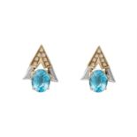 A PAIR OF DIAMOND AND BLUE TOPAZ EARRINGSEach composed of an oval mixed-cut blue topaz to a