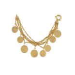 A GOLD CHARM BRACELETThe five fancy-link chains, suspending eight coins, mounted in 18K gold, signed