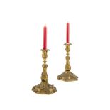 A PAIR OF GILT BRONZE ROCOCO TABLE CANDLESTICKS, in the style of Meissonier, 19th century, the