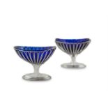 A PAIR OF IRISH GEORGIAN SILVER WIREWORK OVAL SALTS, Dublin 1792, fitted blue glass liners and