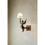A PAIR OF GILTMETAL WALL SCONCES IN THE MANNERIST STYLE, 19th century, the sconces formed as