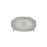 AN IRISH GEORGE III SILVER SHAPED RECTANGULAR TEAPOT STAND, Dublin 1793, mark of Gustavus Byrne,