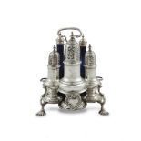 A GEORGE II SILVER CRUET STAND, London 1746, mark of Sam Wood, with ring column handle supporting