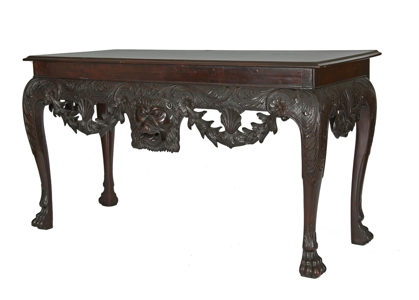 A CARVED MAHOGANY SIDE TABLE IN THE IRISH 18TH CENTURY STYLE, 19th century, the deep frieze