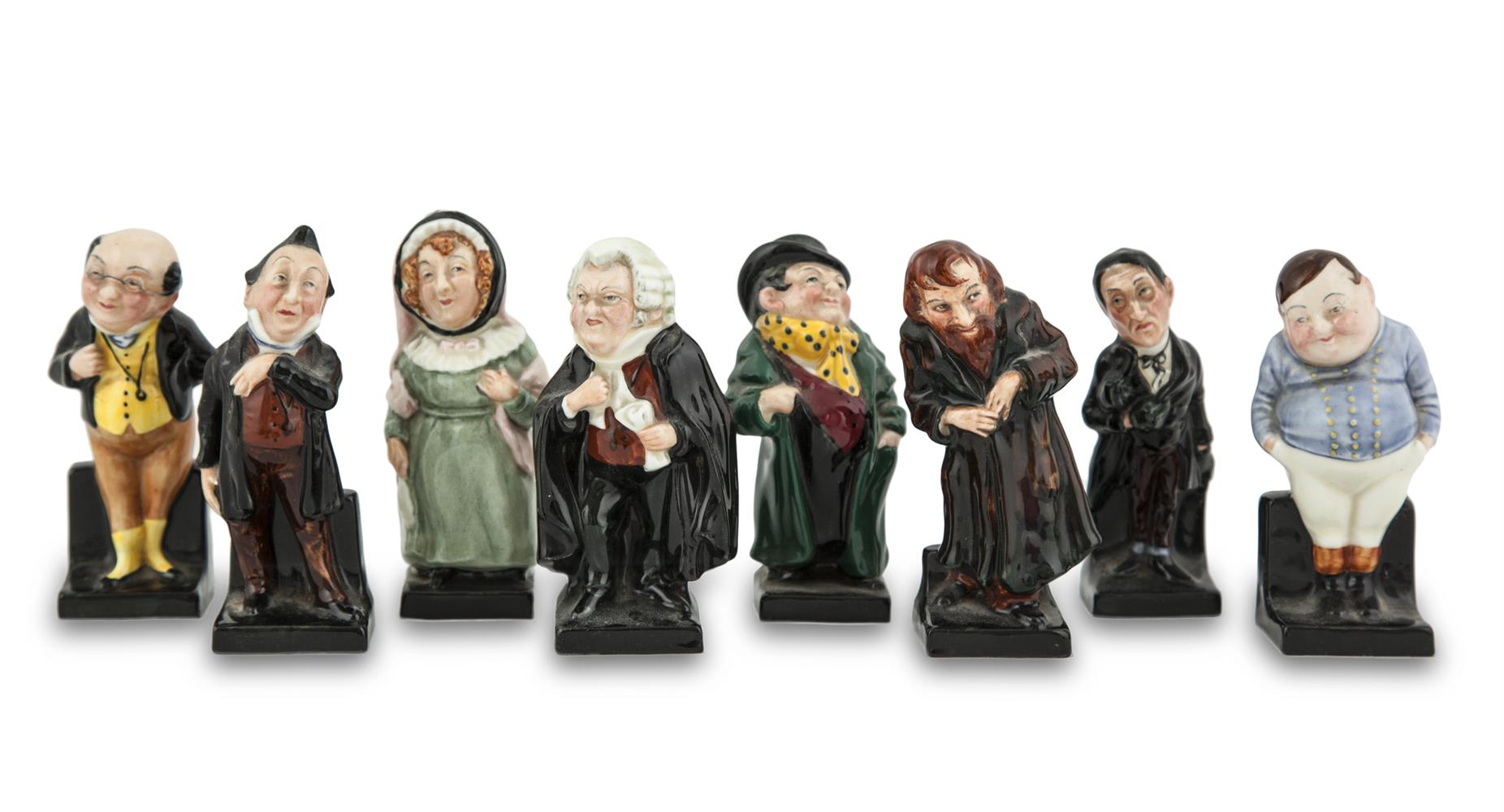 A SET OF EIGHT ROYAL DOULTON CARICATURE PORCELAIN FIGURES, depicting various characters from