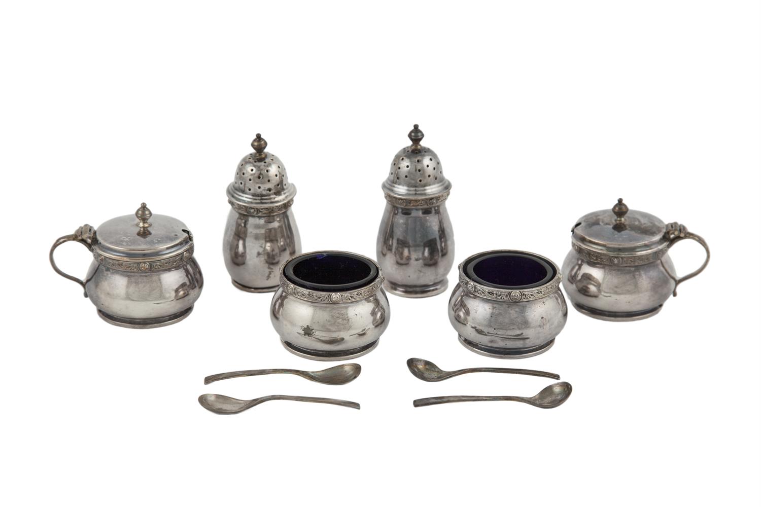 A CASED SET OF SIX SILVER CELTIC PATTERN BALUSTER CONDIMENTS, Birmingham 1947, comprising a pair