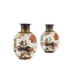 A PAIR OF 19TH CENTURY ROYAL CROWN DERBY PORCELAIN VASES, each of ovoid form, decorated in Imari
