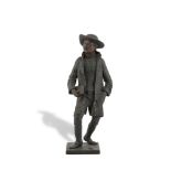 A 19TH CENTURY AMERICAN PAPIER MACHE FIGURE OF A PILGRIM, in stride and carrying a book in his right