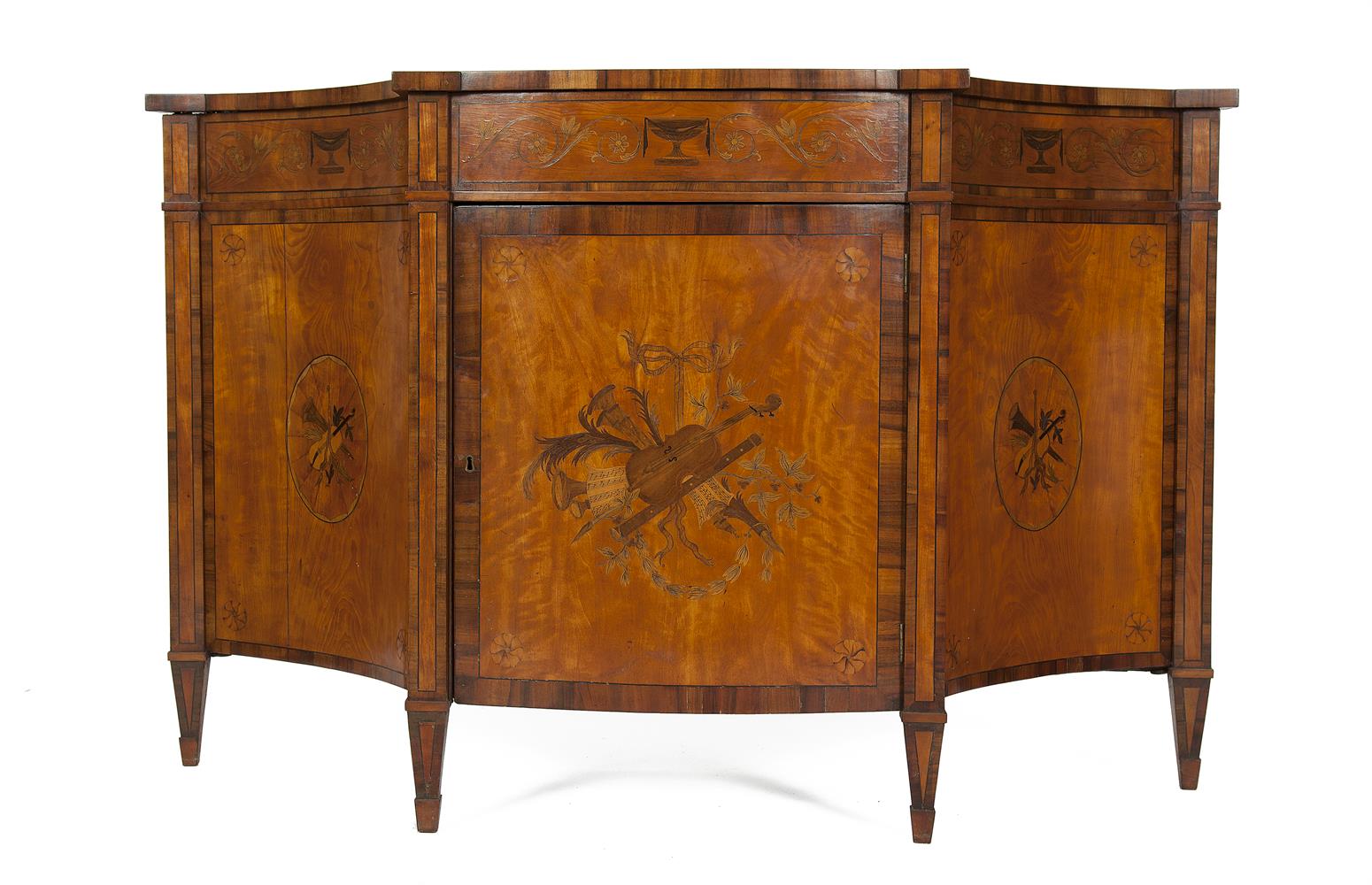 A GEORGE III INLAID SATINWOOD BREAKFRONT SIDE CABINET, the top inlaid with an oval medallion of