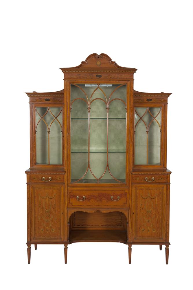 A LATE VICTORIAN INLAID SATINWOOD BREAKFRONT DISPLAY CABINET, by Maple & Co.,Tottenham Court Road,