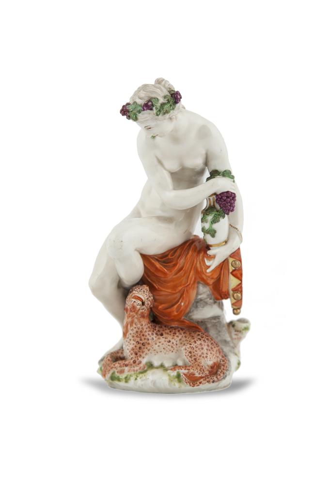 A GERMAN PORCELAIN FIGURE, Ludwigsburg, modelled as a classical female figure holding a tambourine