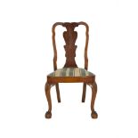 A GEORGE I STYLE WALNUT FRAME SIDE CHAIR, with vase shaped splat, drop in padded seat and raised