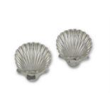 A PAIR OF VICTORIAN SILVER BUTTER SHELLS, London 1895, raised on ball feet (c.120g)