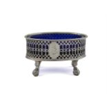 A GEORGIAN SILVER OVAL SALT CELLAR, Sheffield c.1770, with beaded rim above pierced sides, blue