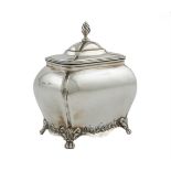 AN EDWARDIAN SILVER SHAPED RECTANGULAR TEA CADDY, Chester 1901, of bombé form, with hinged domed lid