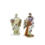 A PAIR OF 18TH CENTURY MEISSEN PORCELAIN FIGURES, modelled as saints, each inscribed with title