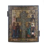 A RUSSIAN 18TH CENTURY PAINTED TIMBER ICON, with inset crucifix in cast brass, flanked by saints