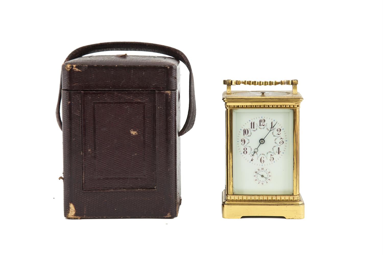 A FRENCH GILT BRASS CARRIAGE CLOCK, c.1900, with repeating movement, the rectangular case surmounted