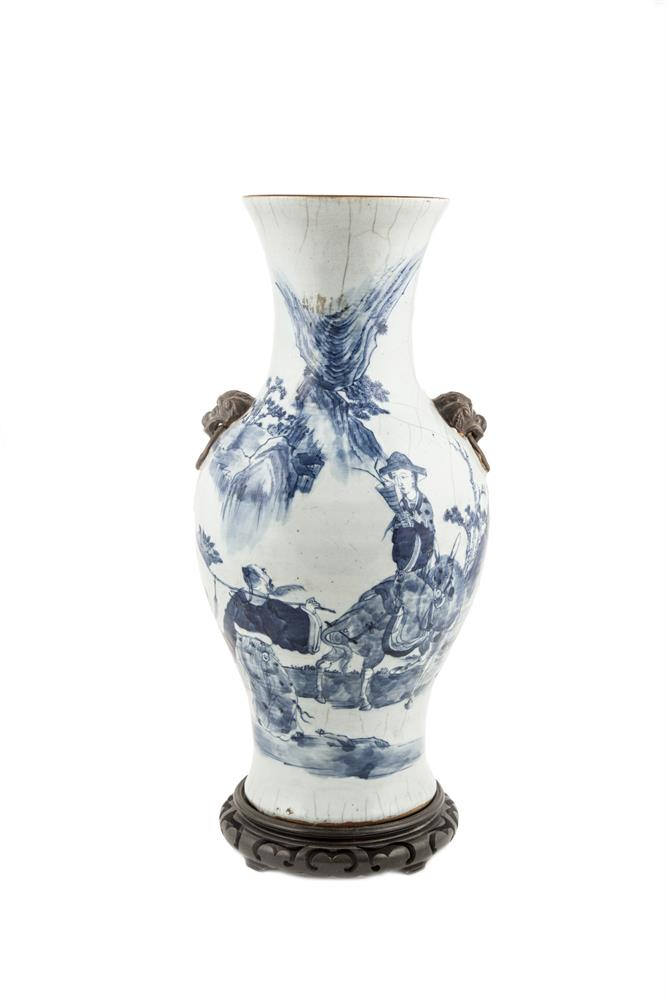 A 19TH CENTURY CHINESE BLUE AND WHITE CRACKLEWARE VASE, decorated with scholars in a mountainous