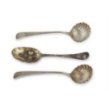 A GEORGE II SILVER TAPER HANDLE BERRY SPOON, London 1746, with parcel gilt bowl, initialed; together