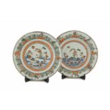 A PAIR OF CHINESE FAMILLE VERTE DISHES, Kangxi period (1660-1722), of shallow circular form, each