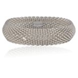 A SILVER BRACELET, BY TIFFANY & CO.The mesh bracelet, mounted in 925 silver, Signed Tiffany & Co,