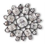 A DIAMOND BROOCH, SECOND HALF OF THE 19TH CENTURYA cushion-shaped diamond to the centre, to