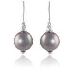 A PAIR OF CULTURED PEARL AND DIAMOND EARRINGSEach round-shaped Tahitian cultured pearl of grey tint,