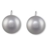 A PAIR OF CULTURED PEARL EARCLIPSEach set with a round-shaped South Sea cultured pearl of grey