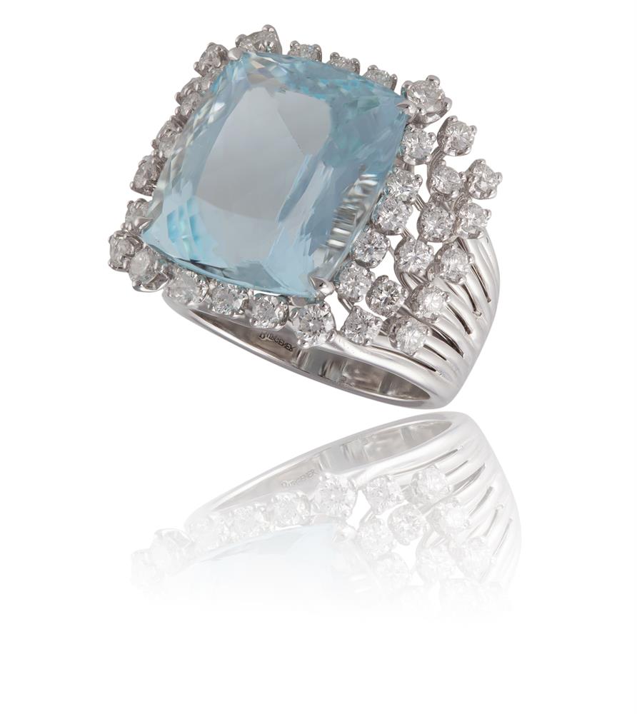 AN AQUAMARINE AND DIAMOND RING, BY MARGHERITA BURGENERDesigned as a cushion-shaped aquamarine,