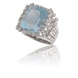 AN AQUAMARINE AND DIAMOND RING, BY MARGHERITA BURGENERDesigned as a cushion-shaped aquamarine,