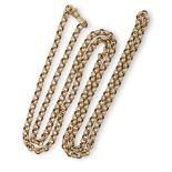 A GEORGIAN STYLE REVIVALIST GUARD CHAIN, CIRCA 1950The gold belcher-link chain decorated