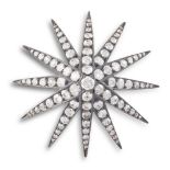 A LATE VICTORIAN DIAMOND STAR BROOCH, CIRCA 1980The twelve-rayed star set throughout with old