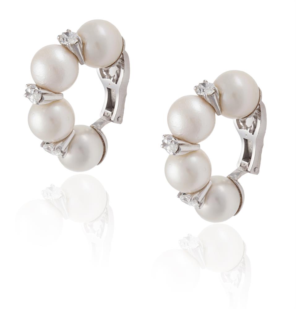 A PAIR OF CULTURED PEARL AND DIAMOND EARCLIPSEach designed as a scroll of cultured pearls,