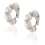 A PAIR OF CULTURED PEARL AND DIAMOND EARCLIPSEach designed as a scroll of cultured pearls,