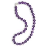 AN AMETHYST AND DIAMOND NECKLACE, BY MARGHERITA BURGENERComposed of 38 amethyst beads,