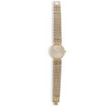 A LADY'S 18K GOLD MANUAL WIND BRACELET WATCH, BY PIAGET, CIRCA 1980The round-shaped case, sunburst