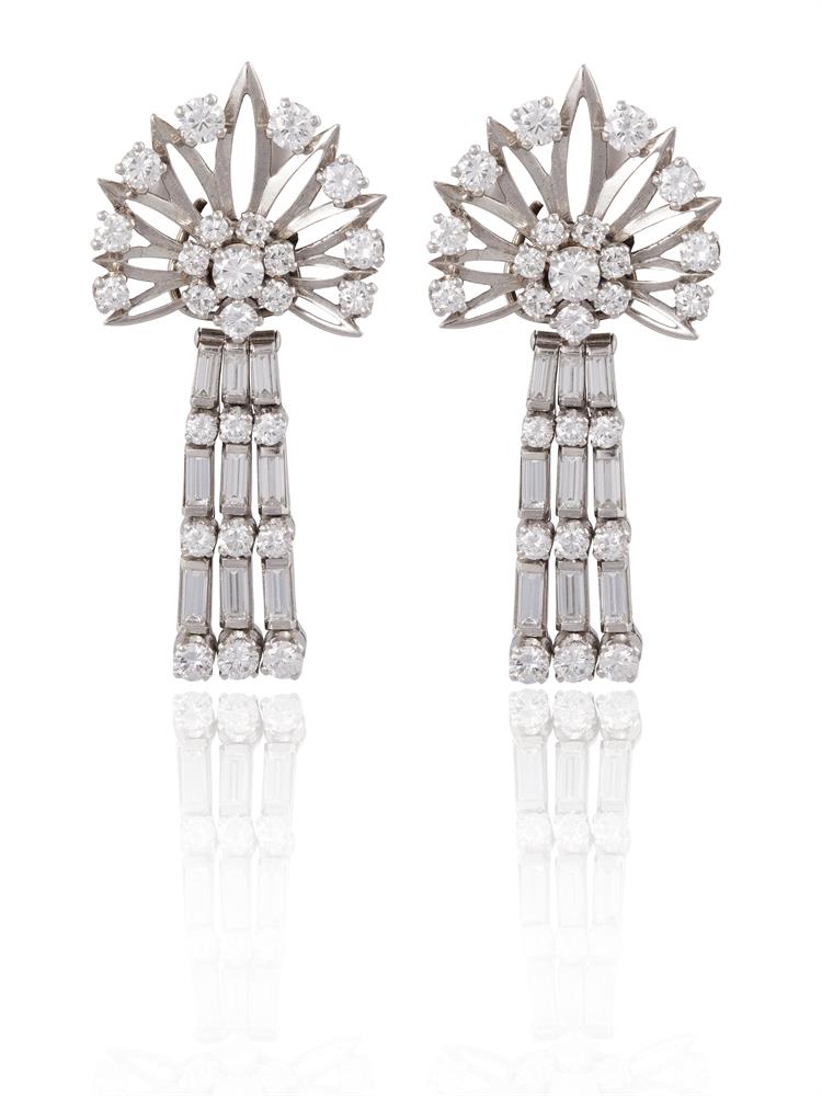 A PAIR OF DAY & NIGHT COCKTAIL PENDENT EARRINGS, CIRCA 1950Each floral design cluster set with round