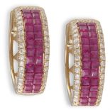 A PAIR OF RUBY AND DIAMOND EARRINGSEach designed with two rows of calibré-cut rubies, within a