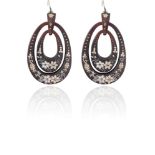 A PAIR OF TORTOISE SHELL PENDENT EARRINGSEach double oval-shaped hoop, decorated with flower motifs,