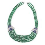 AN EMERALD, SAPPHIRE AND DIAMOND NECKLACEThe emerald graduating beads, strung as a multi-row