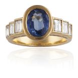 A SAPPHIRE AND DIAMOND RINGThe oval-shaped sapphire, weighing approximately 1.90cts, between