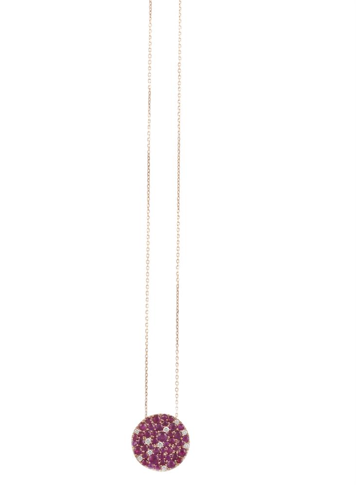 A RUBY AND DIAMOND PENDANT NECKLACEThe fine trace-link chain, suspending a round-shaped disc set