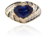 A SAPPHIRE AND DIAMOND RINGThe heart-shaped sapphire, weighing approximately 2.70cts, within a