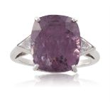 A SPINEL AND DIAMOND RINGThe cushion-shaped spinel within a four-claw setting, weighing 12.20cts,