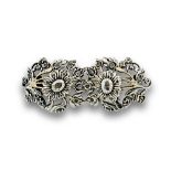 Broche s.XIX con doble centro floral de diamantes, en montura de plata y plata vermeill en