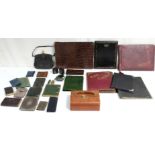 5. A crocodile skin bound photograph album; a crocodile skin purse; a black leather purse with