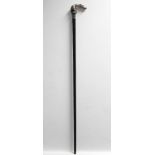 12. An early 20th century ebony walking cane with Norwegian silver (·830 standard) dragon handle.