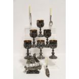A set of six wine goblets with gilt interiors; an eastern model of a junk; a pickle fork &
