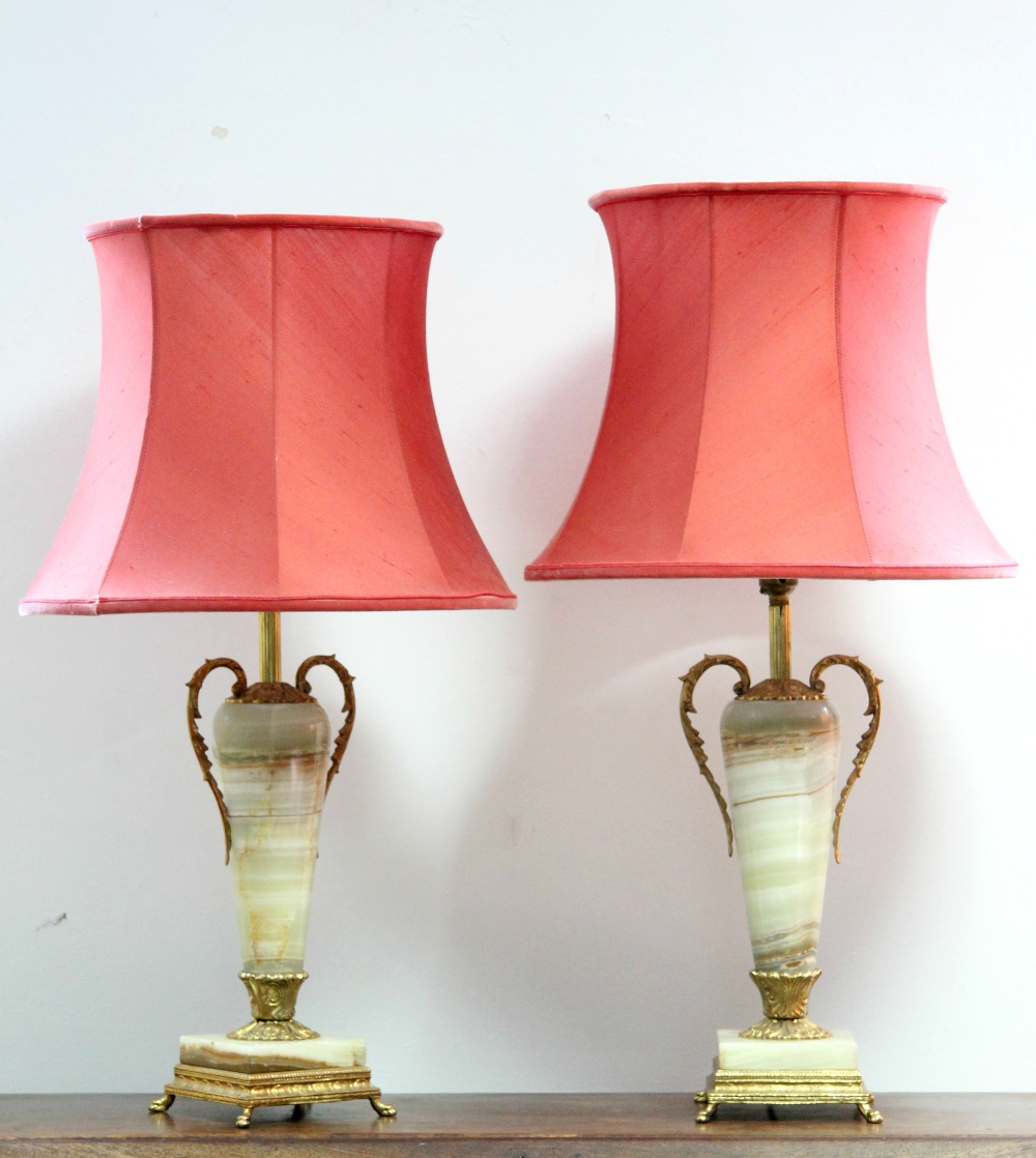 A pair of pale green onyx & gilt-metal slender vase-shaped table lamps on square bases; 13¼” high,